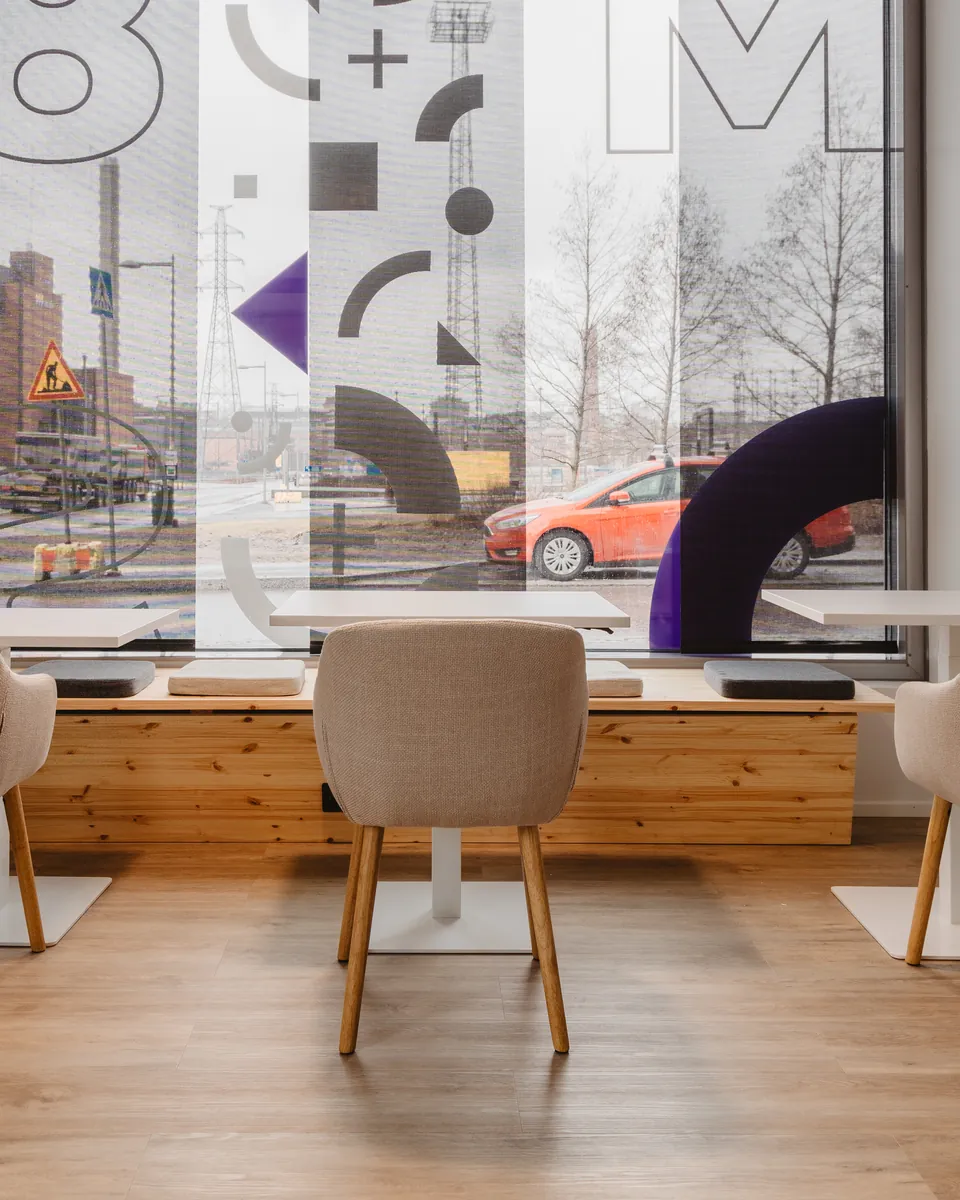 Window graphics and seating at M8S Hub